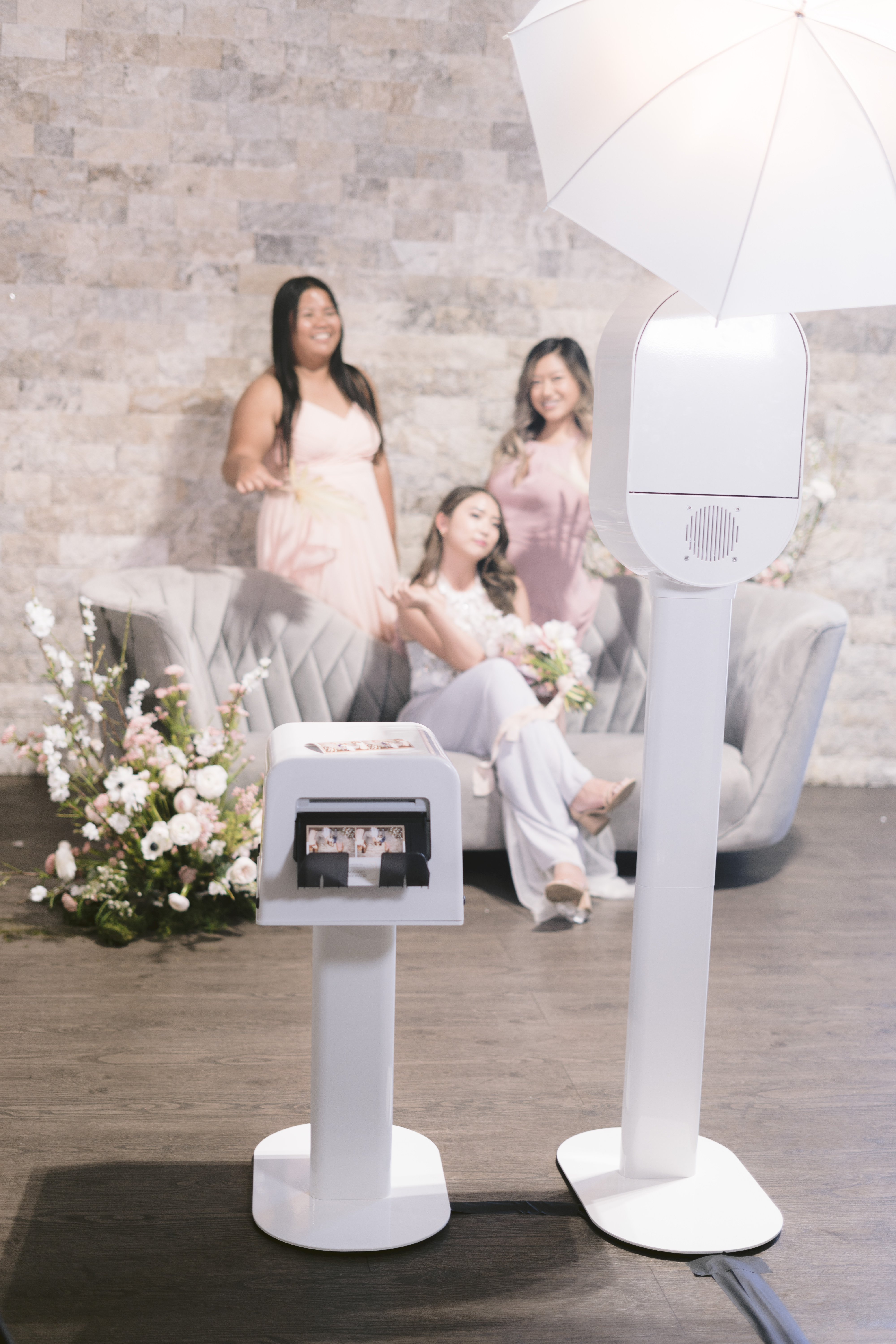 Booth setup with bridesmaids